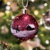 christmas bauble with farm elf, barn and winter landscape